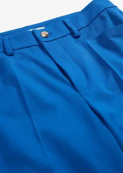 Pantalon 7/8 évasé avec bouton décoratif