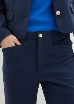 Pantalon 7/8 évasé avec bouton décoratif