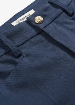 Pantalon 7/8 évasé avec bouton décoratif