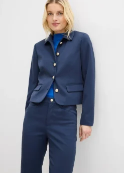 Pantalon 7/8 évasé avec bouton décoratif