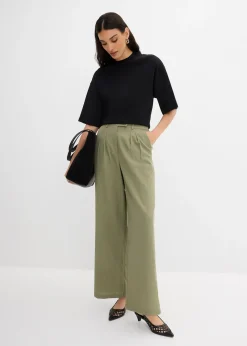 Pantalon avec bouton décoratif