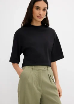 Pantalon avec bouton décoratif