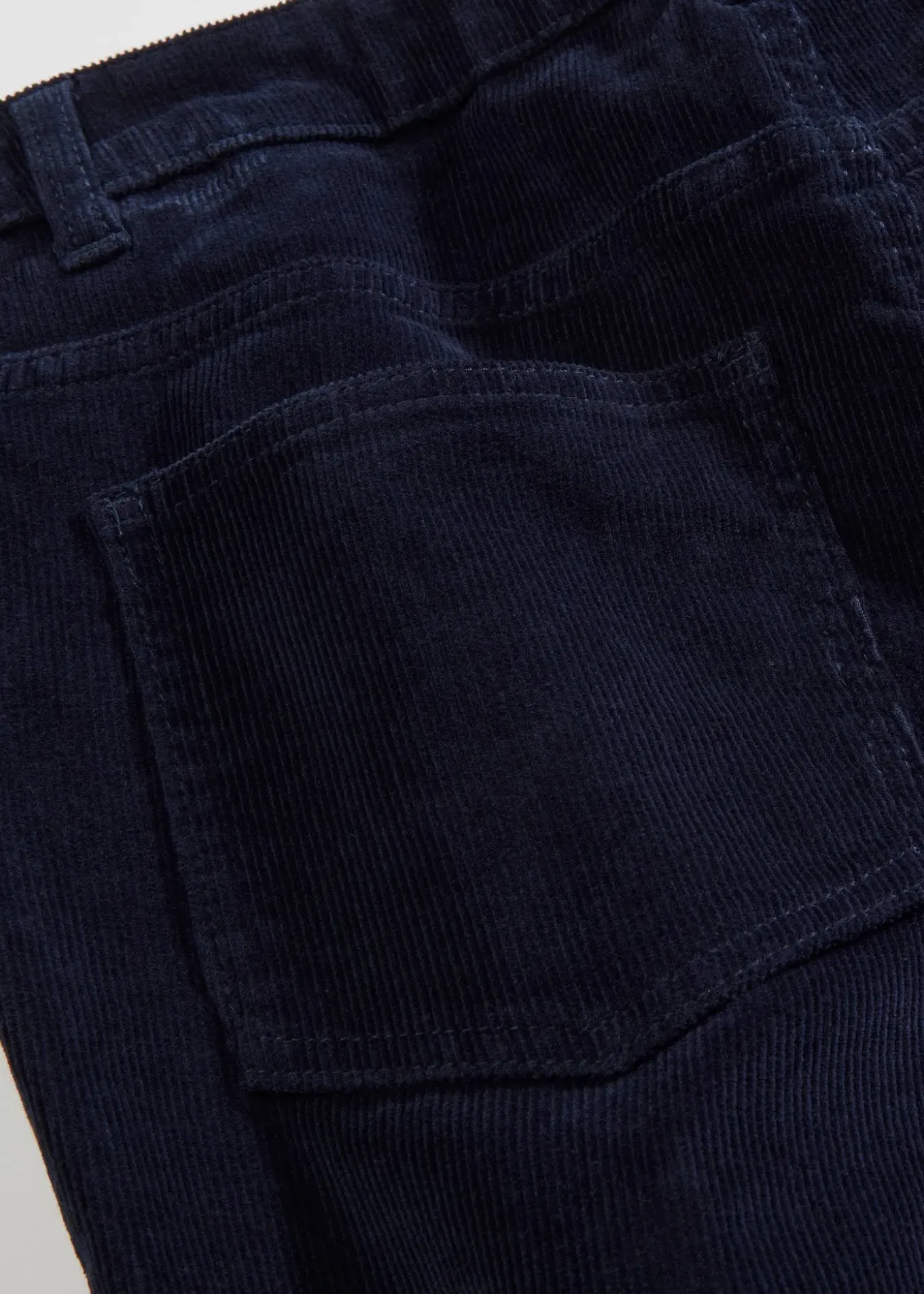 Pantalon bootcut en velours côtelé extensible