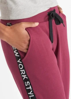 Pantalon de jogging avec finitions bord-côtes et imprimé