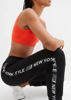 Pantalon de jogging avec finitions bord-côtes et imprimé