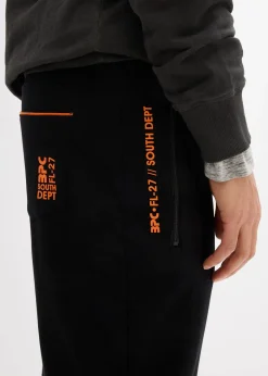 Pantalon de jogging en coton avec poches zippées pratiques