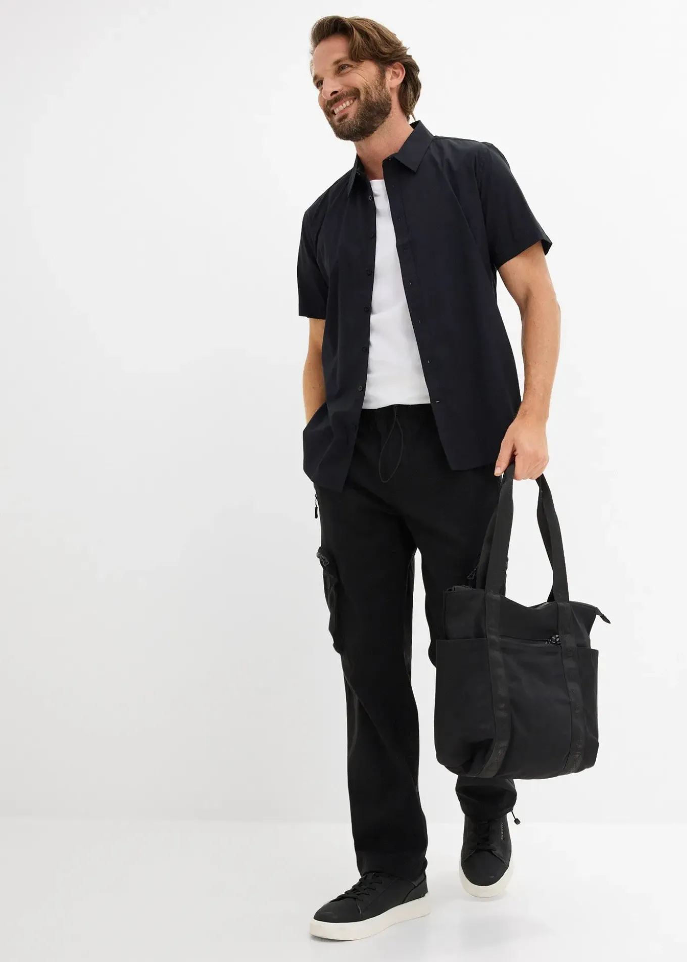 Pantalon droit très extensible à poches cargo zippées, regular