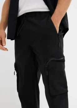 Pantalon droit très extensible à poches cargo zippées, regular