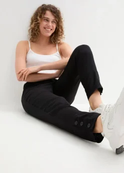 Pantalon en lin avec détails poche et boutons à la base