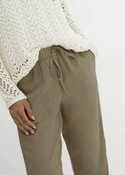 Pantalon en lin majoritaire avec empiècement de dentelle sur le côté, longueur cheville