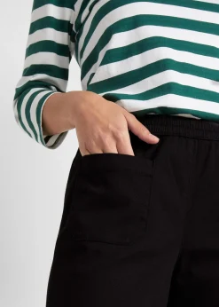 Pantalon en twill avec jambes évasées et taille confortable