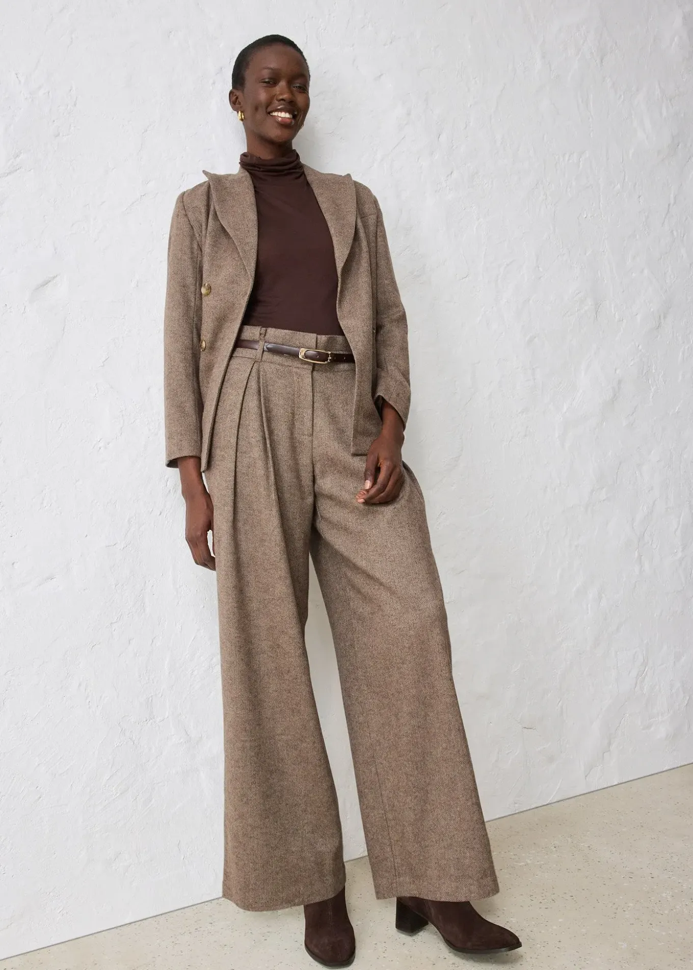 Pantalon large à pinces en laine majoritaire