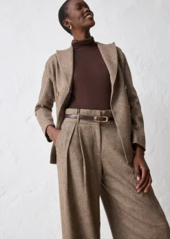 Pantalon large à pinces en laine majoritaire