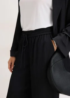 Pantalon large à taille élastiquée