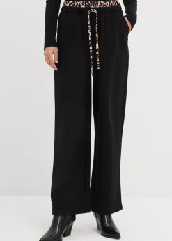 Pantalon large en sweat à ceinture contrastante