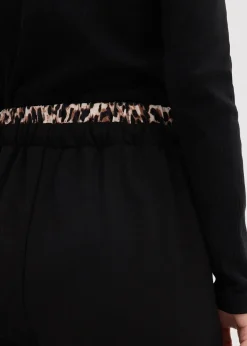 Pantalon large en sweat à ceinture contrastante