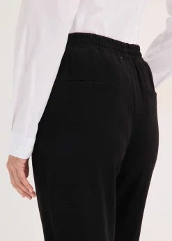 Pantalon élastiqué avec nervures devant