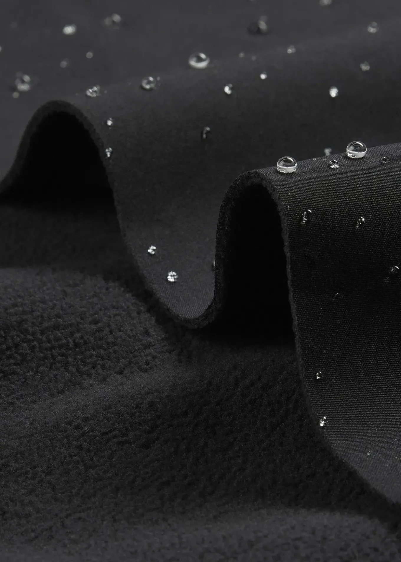 Pantalon technique en softshell extensible et déperlant