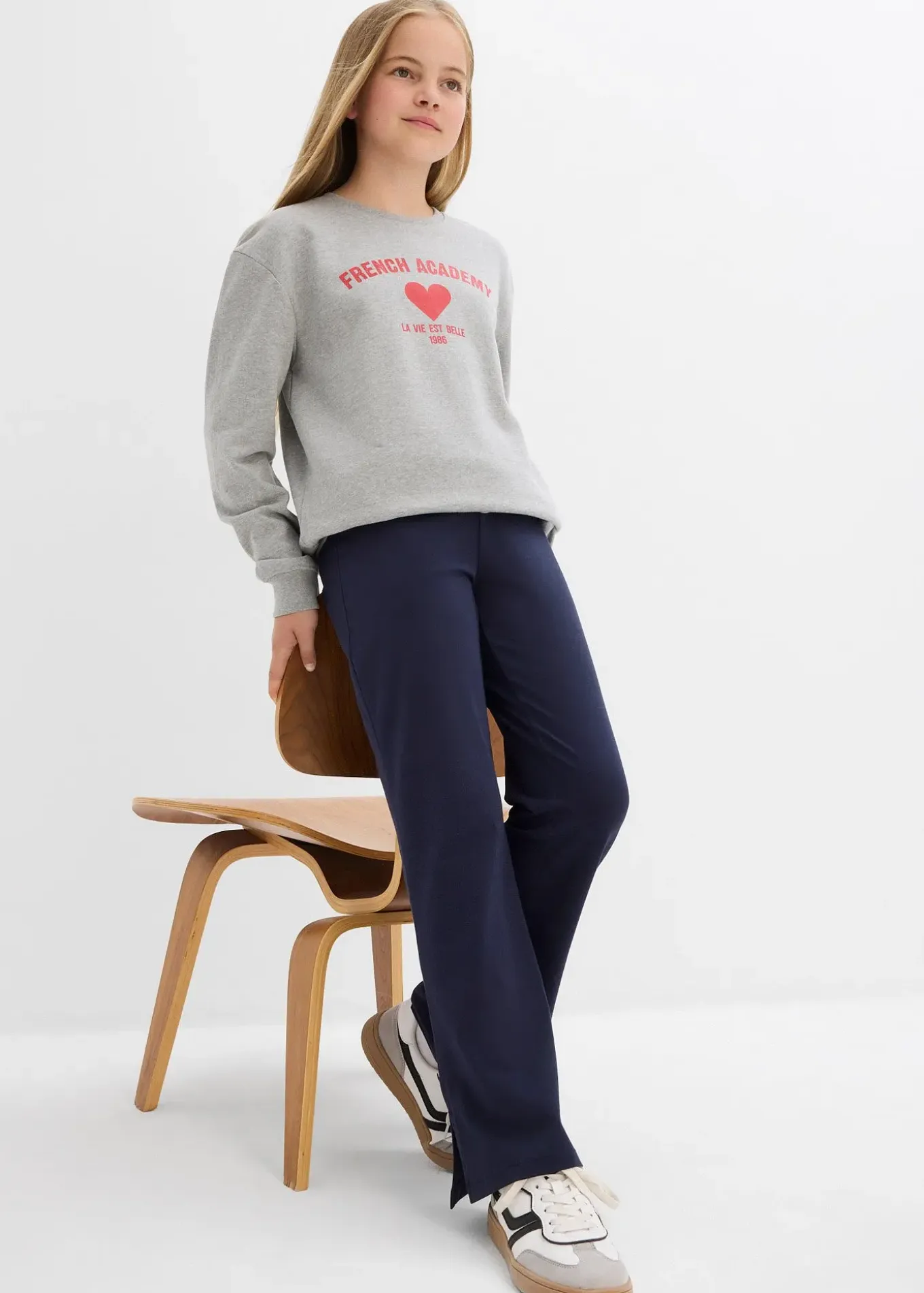 Pantalon évasée en coton extensible avec fentes sur les côtés