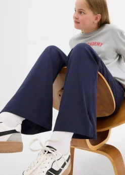 Pantalon évasée en coton extensible avec fentes sur les côtés