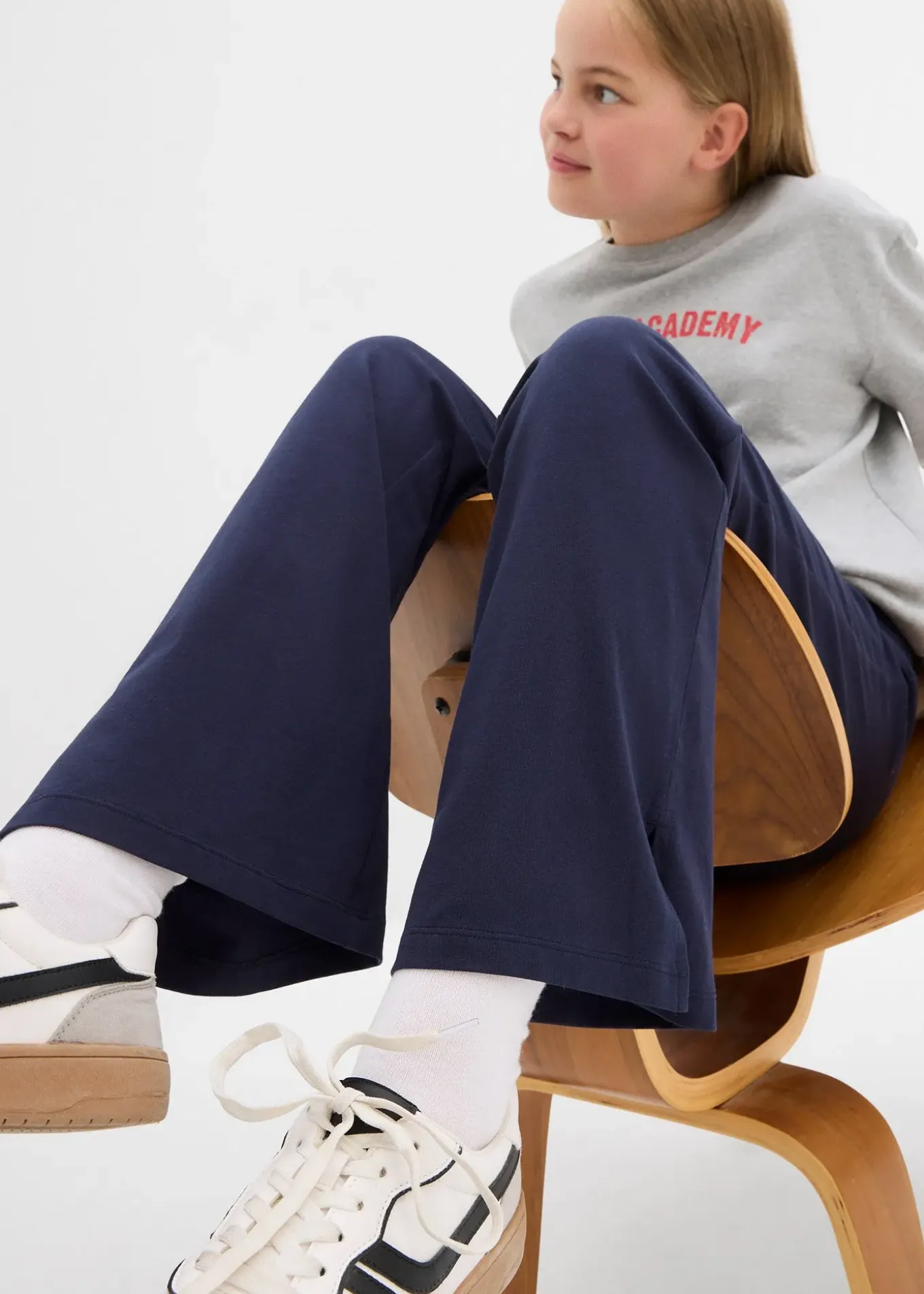 Pantalon évasée en coton extensible avec fentes sur les côtés