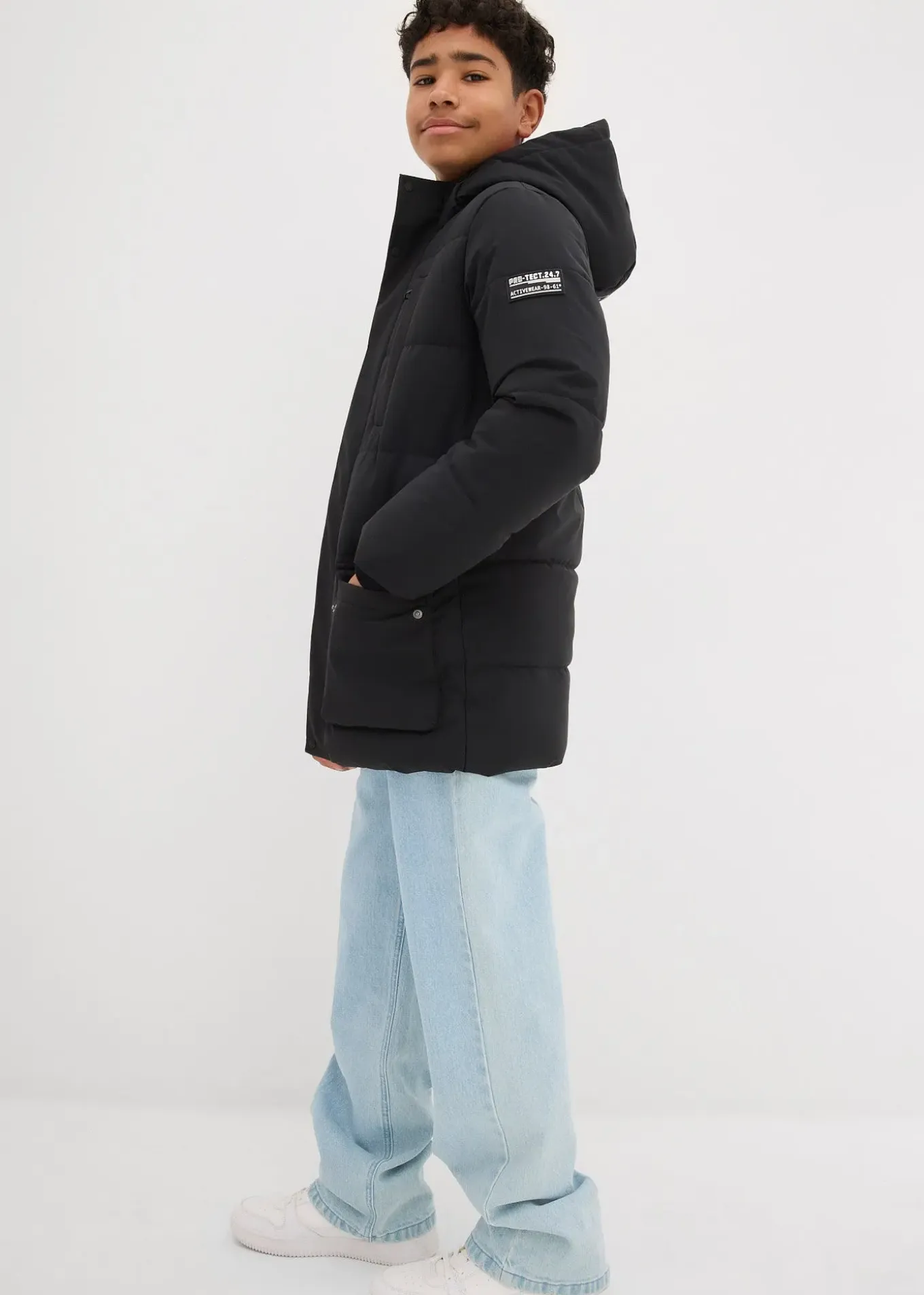 Parka matelassée à capuche et détails sportifs