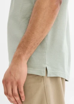 Polo zippé en maille piquée 100% coton