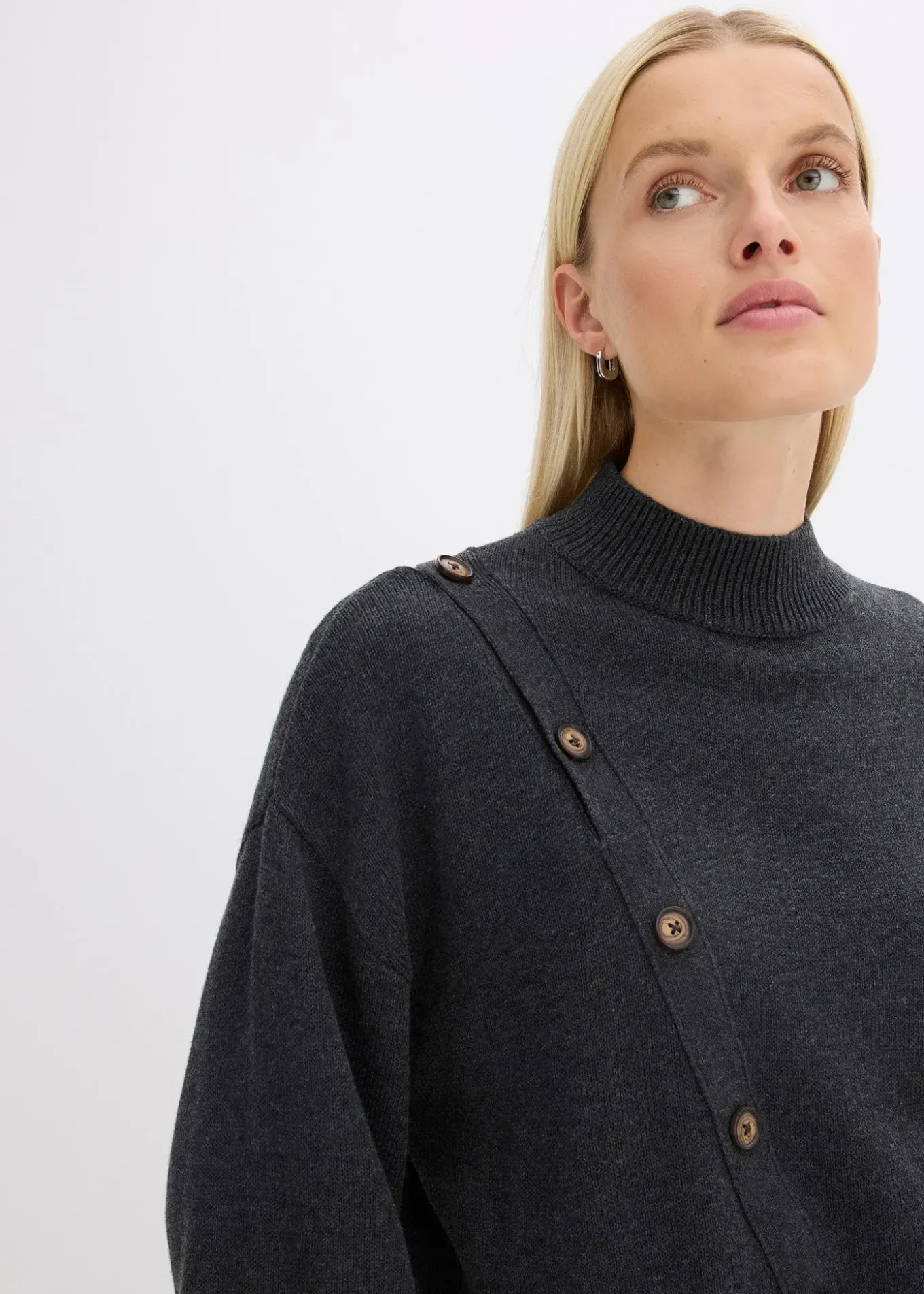 Pull à boutonnage asymétrique