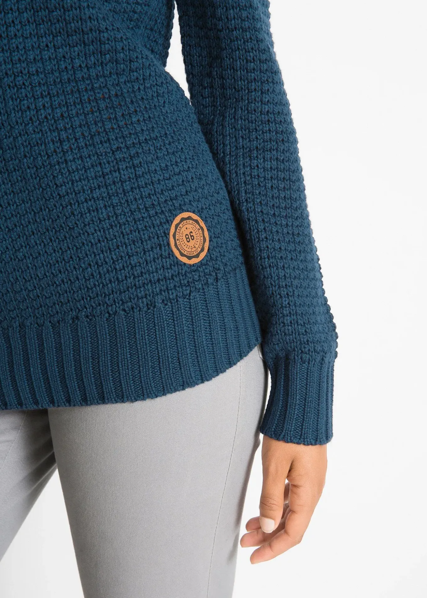 Pull à col roulé avec cordons