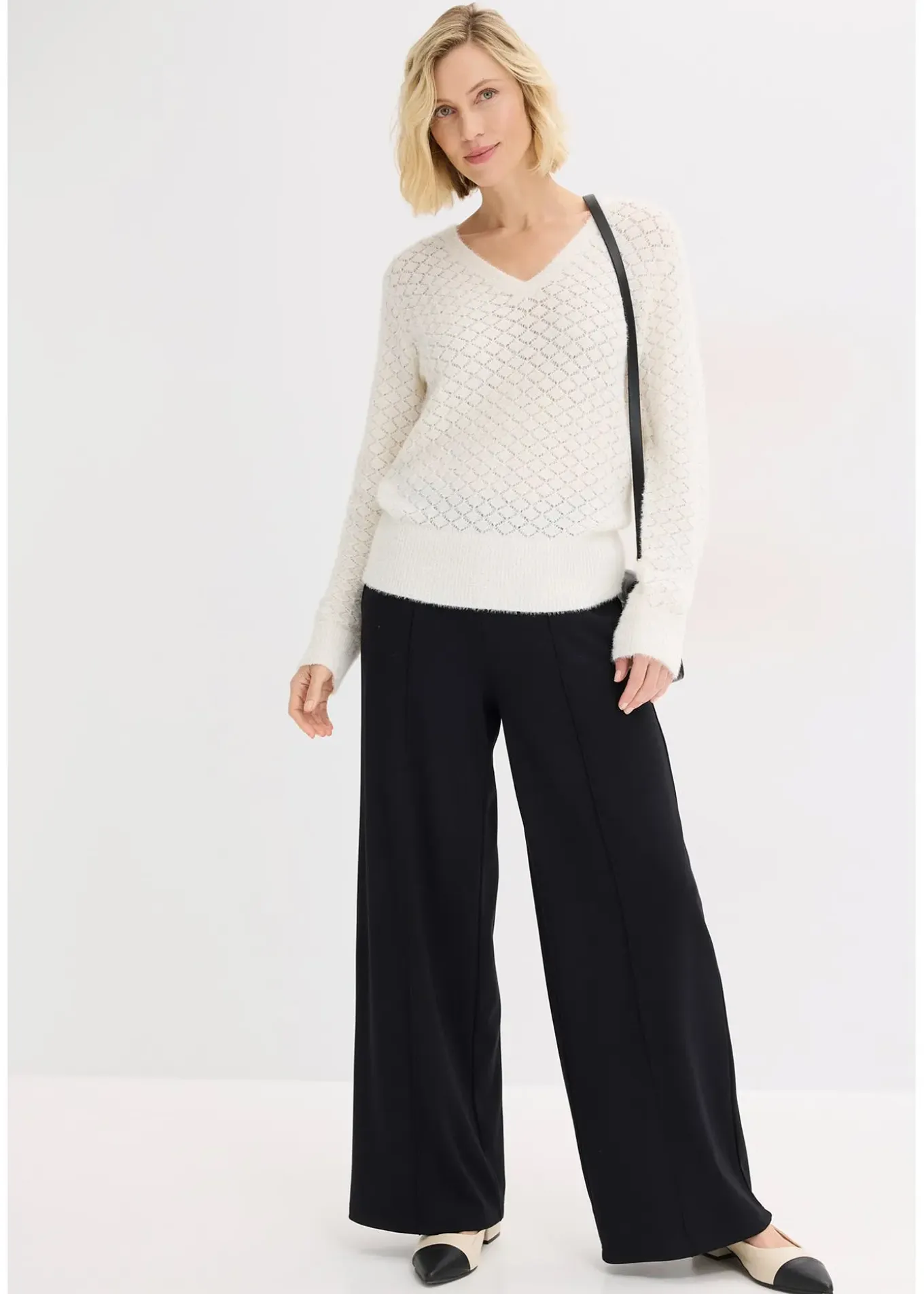 Pull ajouré avec fil peluche