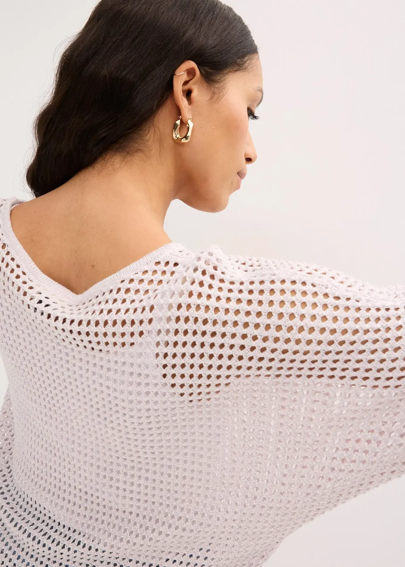 Pull ajouré brillant