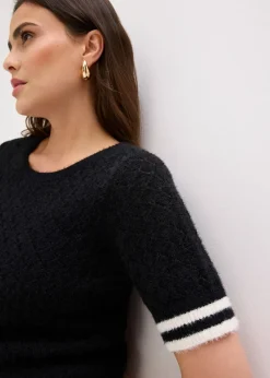 Pull ajouré en maille poilue