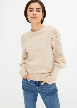Pull aux manches ajourées
