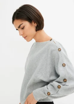 Pull avec détails boutons