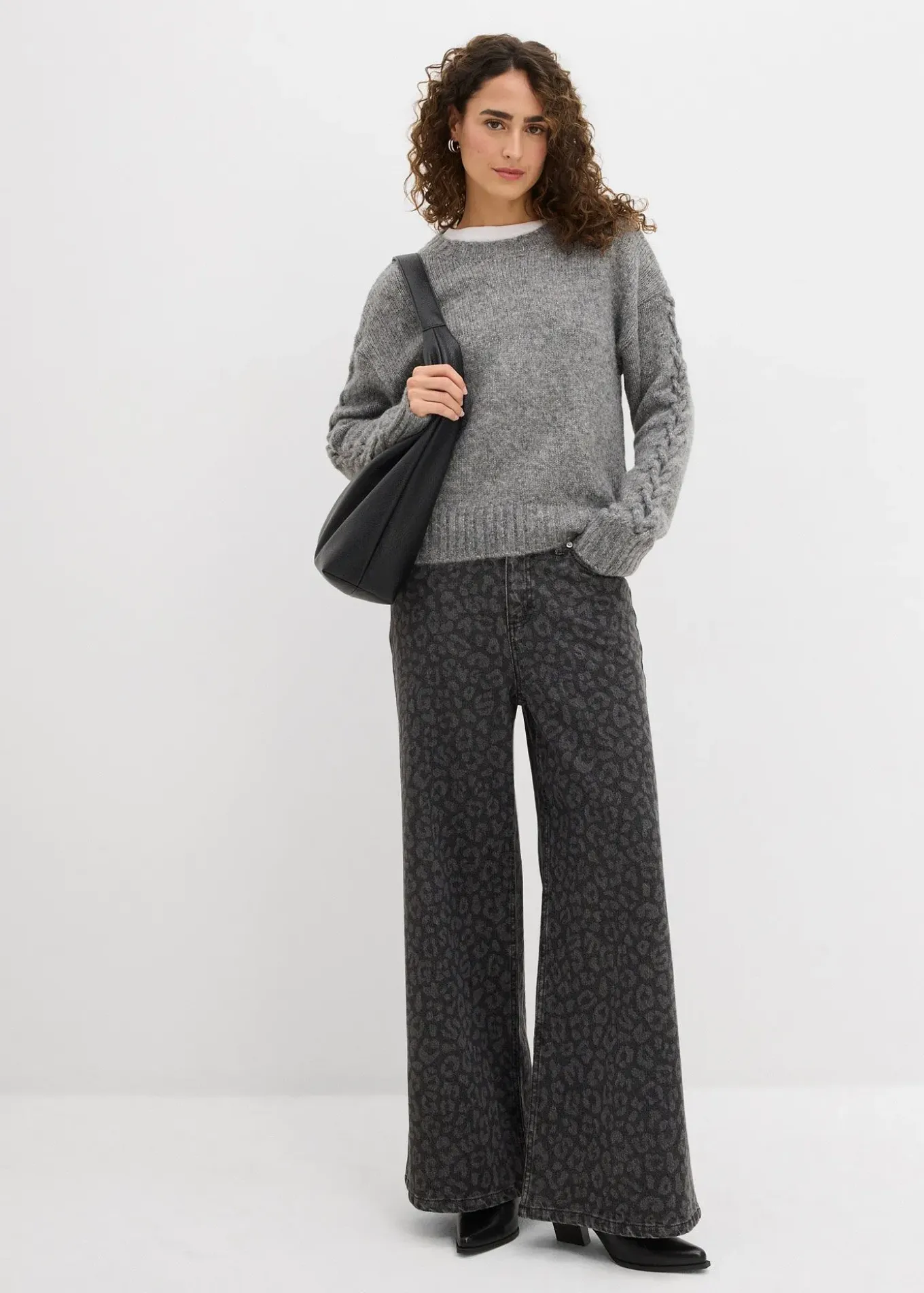 Pull boxy avec motif tressé sur les manches