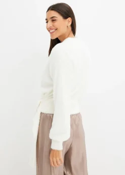 Pull cache-cœur avec accessoire