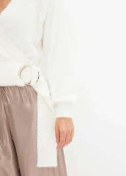 Pull cache-cœur avec accessoire