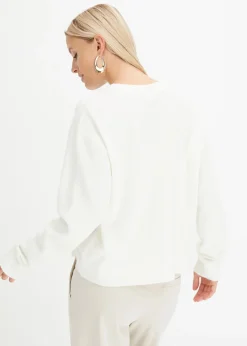 Pull col rond à épaules descendues