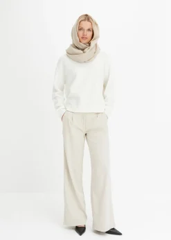 Pull col rond à épaules descendues