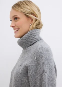 Pull col roulé avec strass