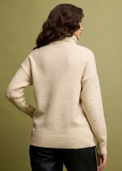 Pull col roulé avec strass
