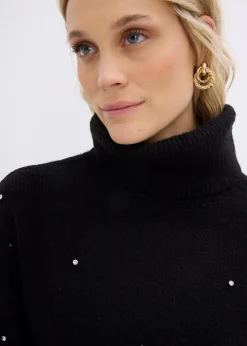 Pull col roulé avec strass