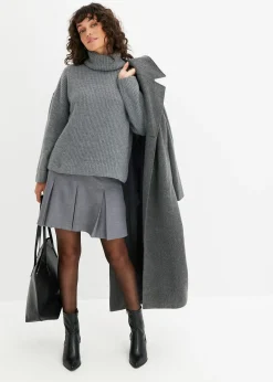 Pull col roulé en maille côtelée