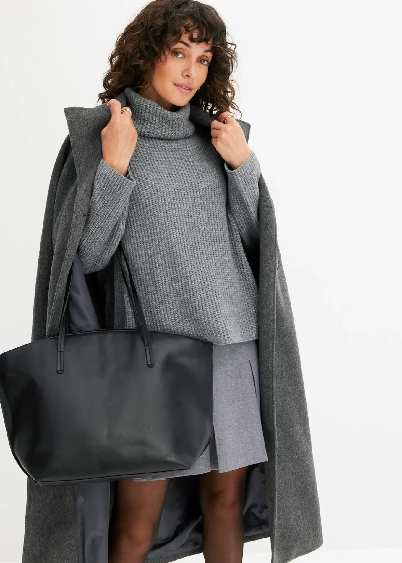 Pull col roulé en maille côtelée