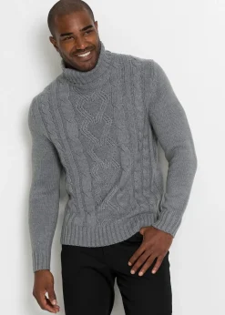 Pull col roulé en maille torsadée