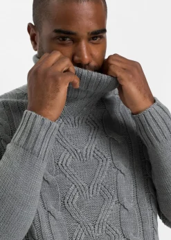 Pull col roulé en maille torsadée