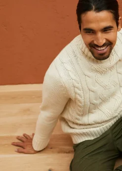 Pull col roulé en maille torsadée