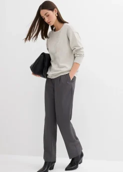 Pull en fine maille à boutons asymétriques