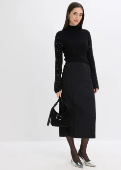 Pull en fine maille à manches trompette décorées de strass