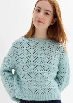 Pull en grosse maille à broderie ajourée
